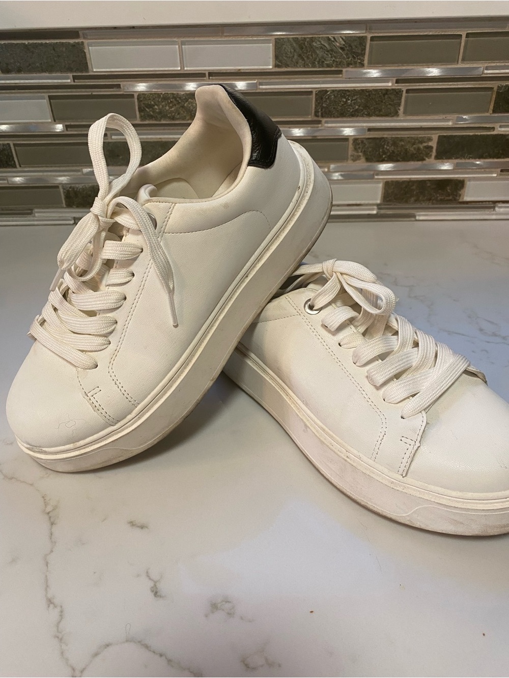 Torrid Ladies White Low-Top Sneakers with Black Heel Accent
